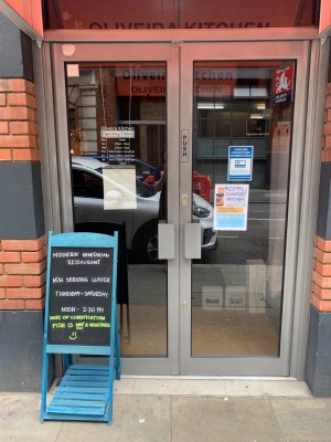 Doors on left side of the venue, push right door from centre to open.