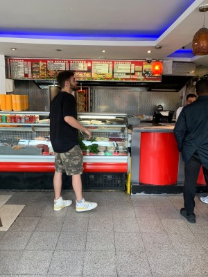 Counter straight ahead from front entry, pay point on the right. Menu on wall above counter.