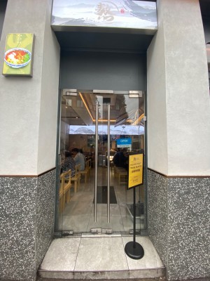 Push glass doors with handle in the middle.