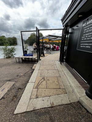 Built-in ramp leading up to black gate. Pull from left to open.