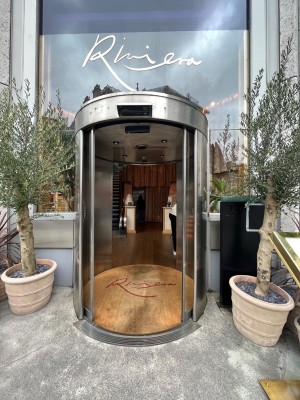 Glass sliding doors with handles in middle.