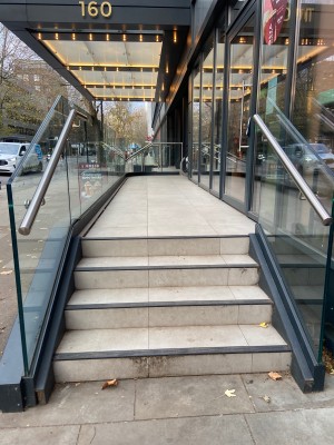 From bottom of entrance steps. Colour contrasted steps ahead.