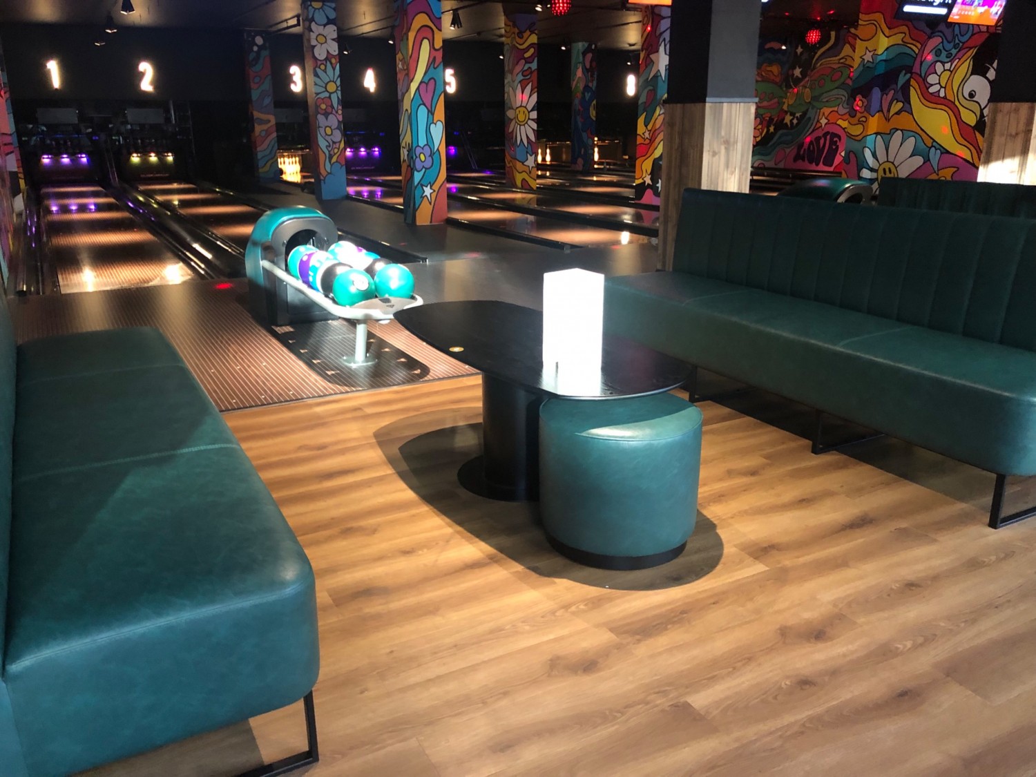 Blowing alley with bench seating and wooden floors