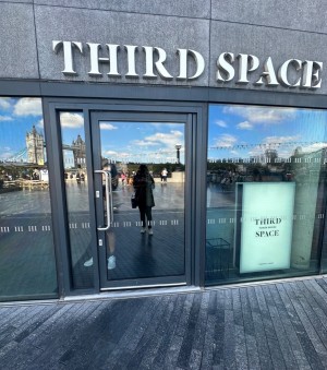 Door with grey doorframe. Push open from left.
