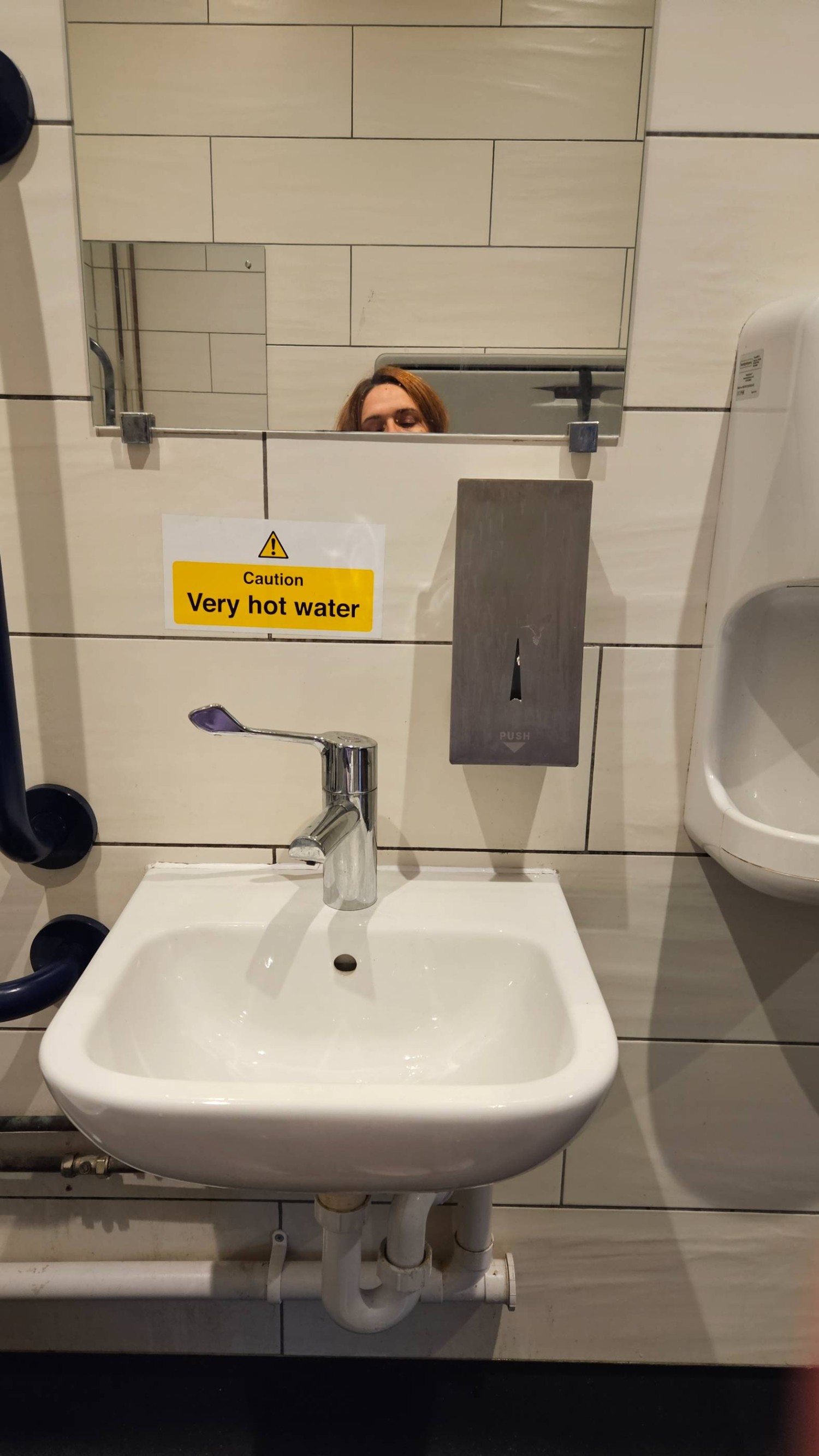 Clear underneath sink. Seating height mirror