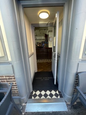 Built in ramp and then pull grey door from left.
