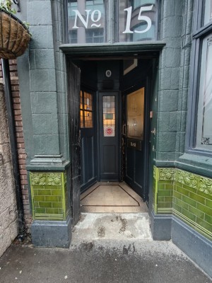 Preceding archway to entrance.