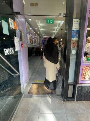 Pull from right to open. Glass door. Small bump.