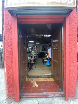 Brown doors ahead. Push from centre to open.