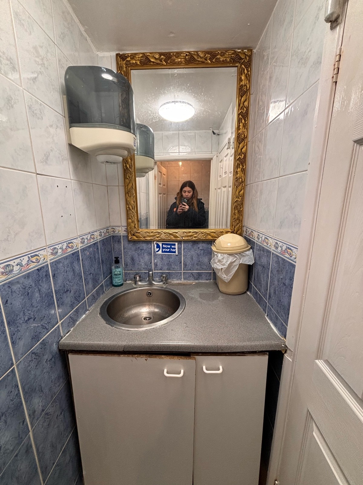From door facing right. Sink ahead.