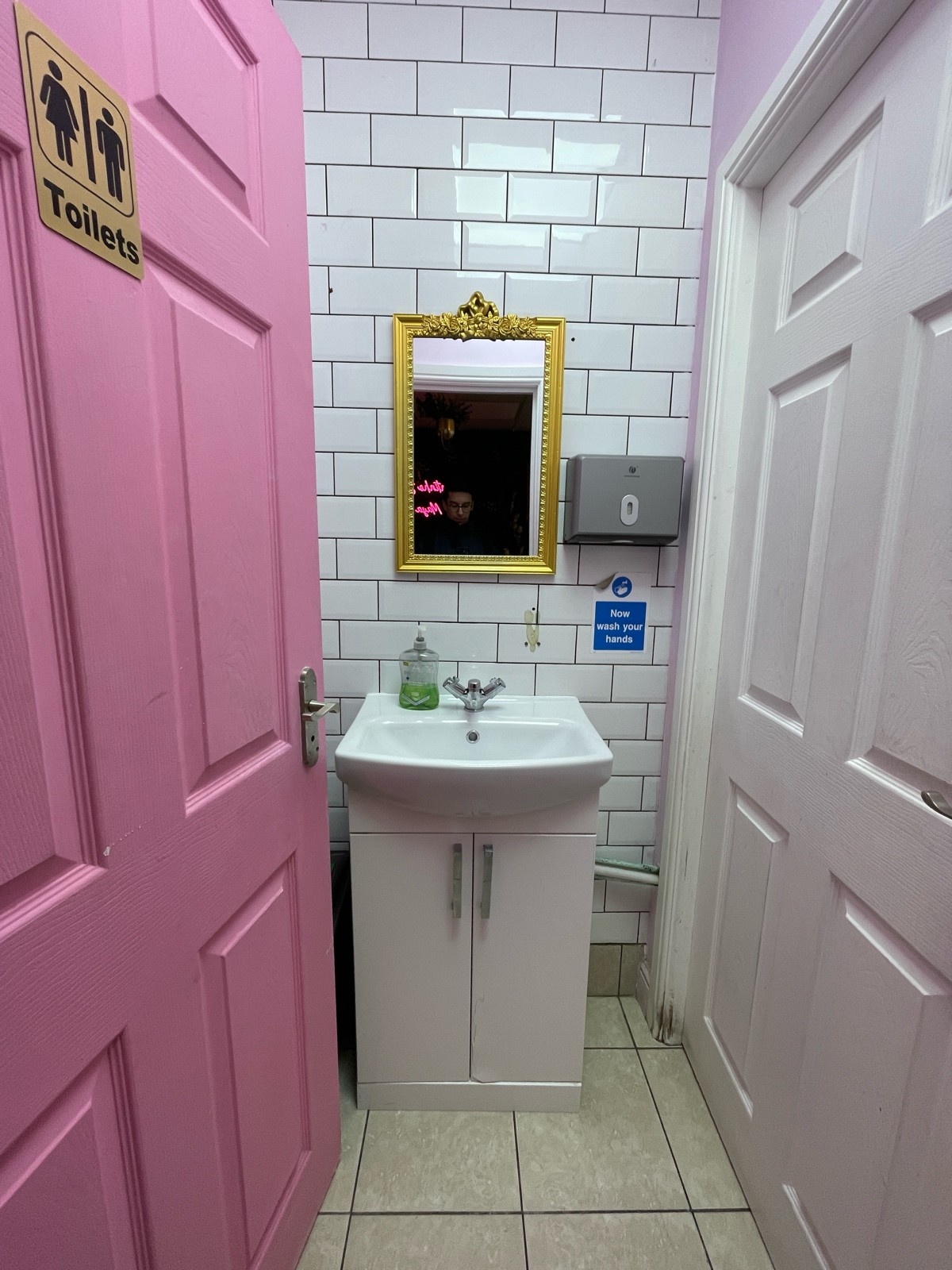 From door facing straight. Sink ahead.