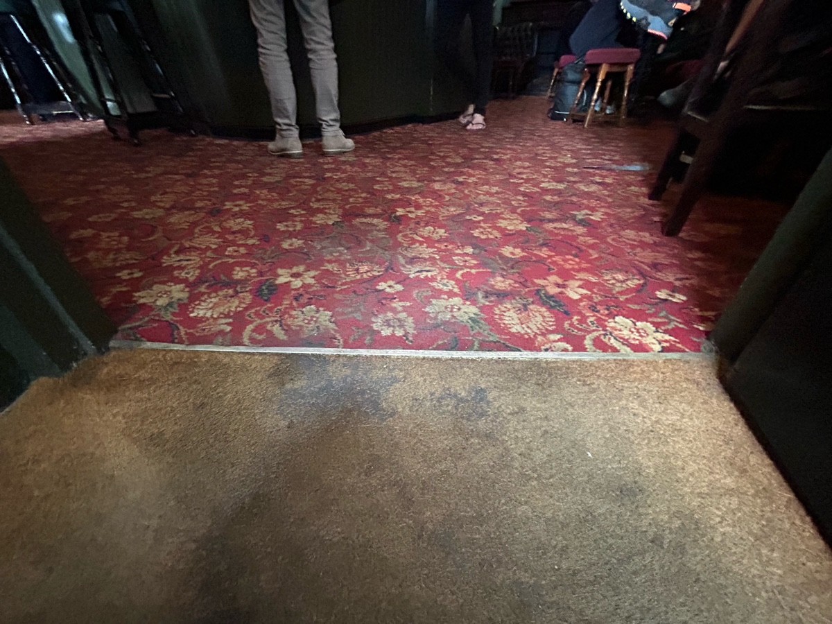 Small bump at foot of door.