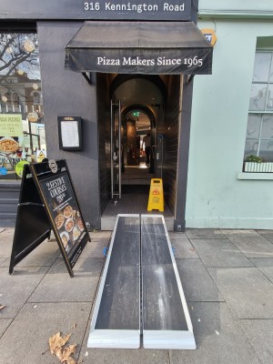 Ramp upon request to preceding archway to entrance.