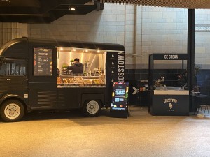 Food truck with open counter. Order to the right and collect from the left. Outdoor seating available to the left.