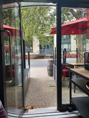 Main doors to the cafe. One door is left open but the other can be unlocked for extra width. Push to open from left.