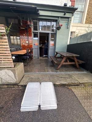 1 step with ramp upon request followed by path straight ahead to main entrance.
