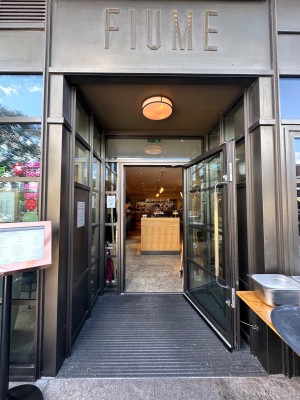Single glass door with handle on the left hand side. Pull.
