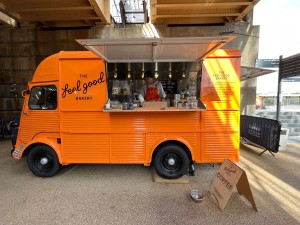 Counter ahead within kiosk van. A-frame to right.