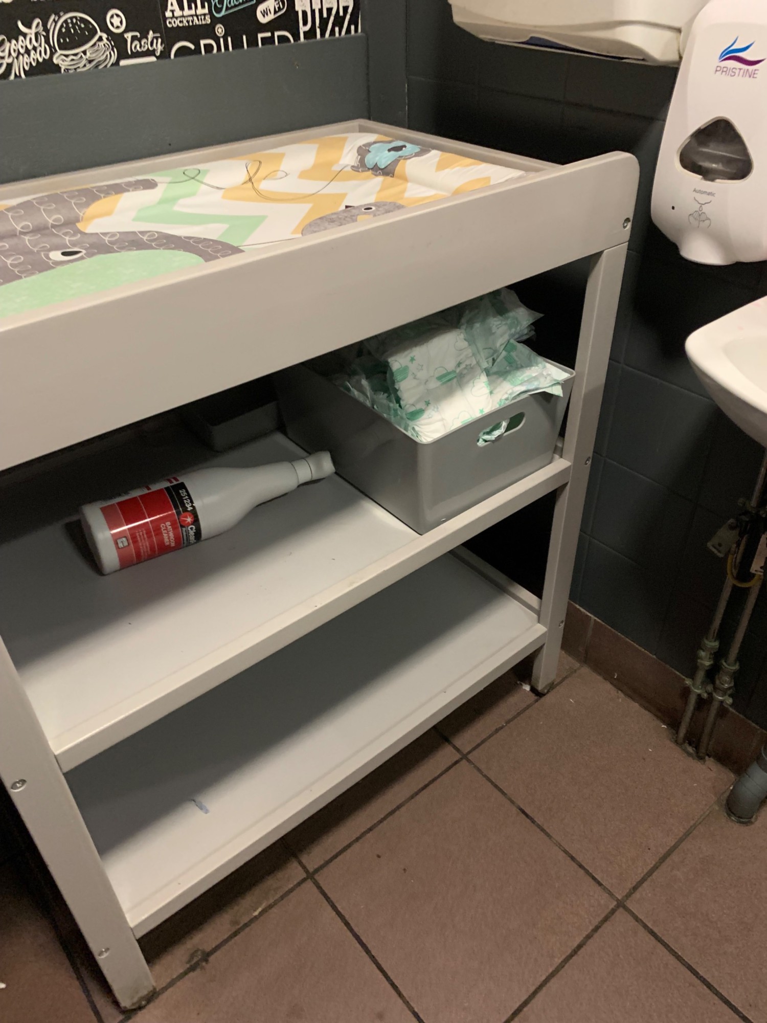 Baby change station put in room makes getting a wheelchair into the bathroom impossible.