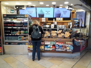 Open archway entrance ahead. Counter in centre.