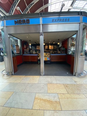 From main Paddington Station facing venue. Open archway ahead. Separating pillar obstructing in centre.