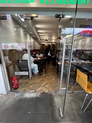 Glass door. Pull from left to open.
