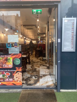 Glass door. Push from left to open.