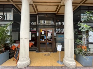 Central pathway between two pillars. Small bump in between pillars. Door straight ahead.