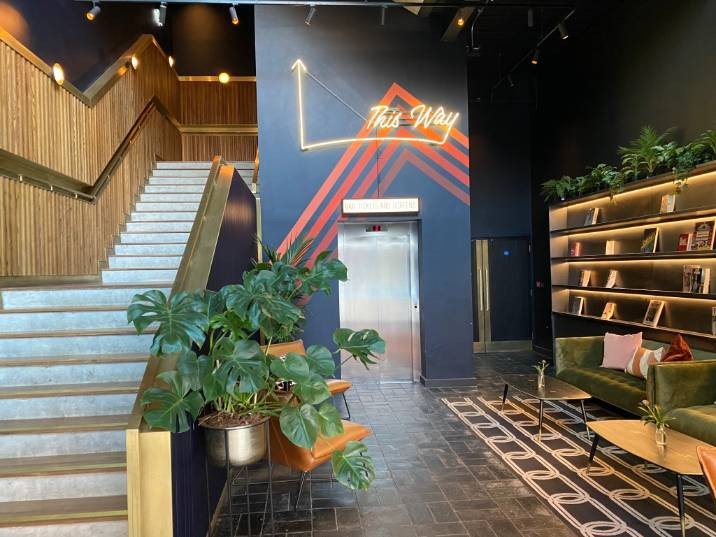 Entrance with stairs and lift to the bar/restaurant and screens.