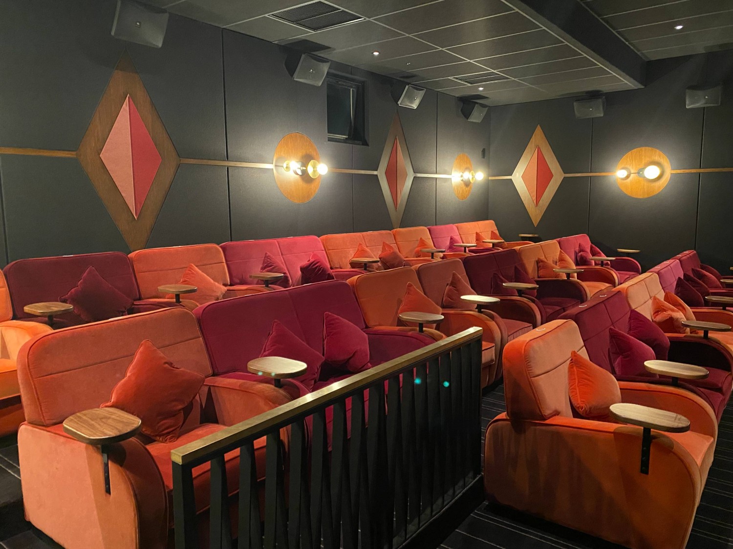 Smallest cinema screen with 1-2 spaces for a wheelchair at the front.