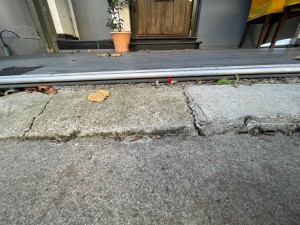 Large step up to raised platform before door.