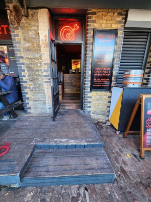 Two steps up to entrance at back.