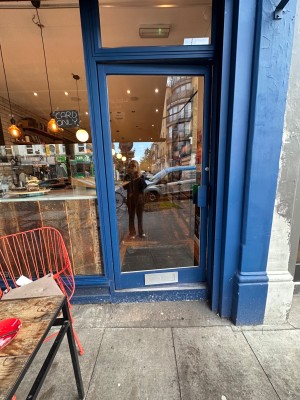 Manual wooden and glass door. Push from right.