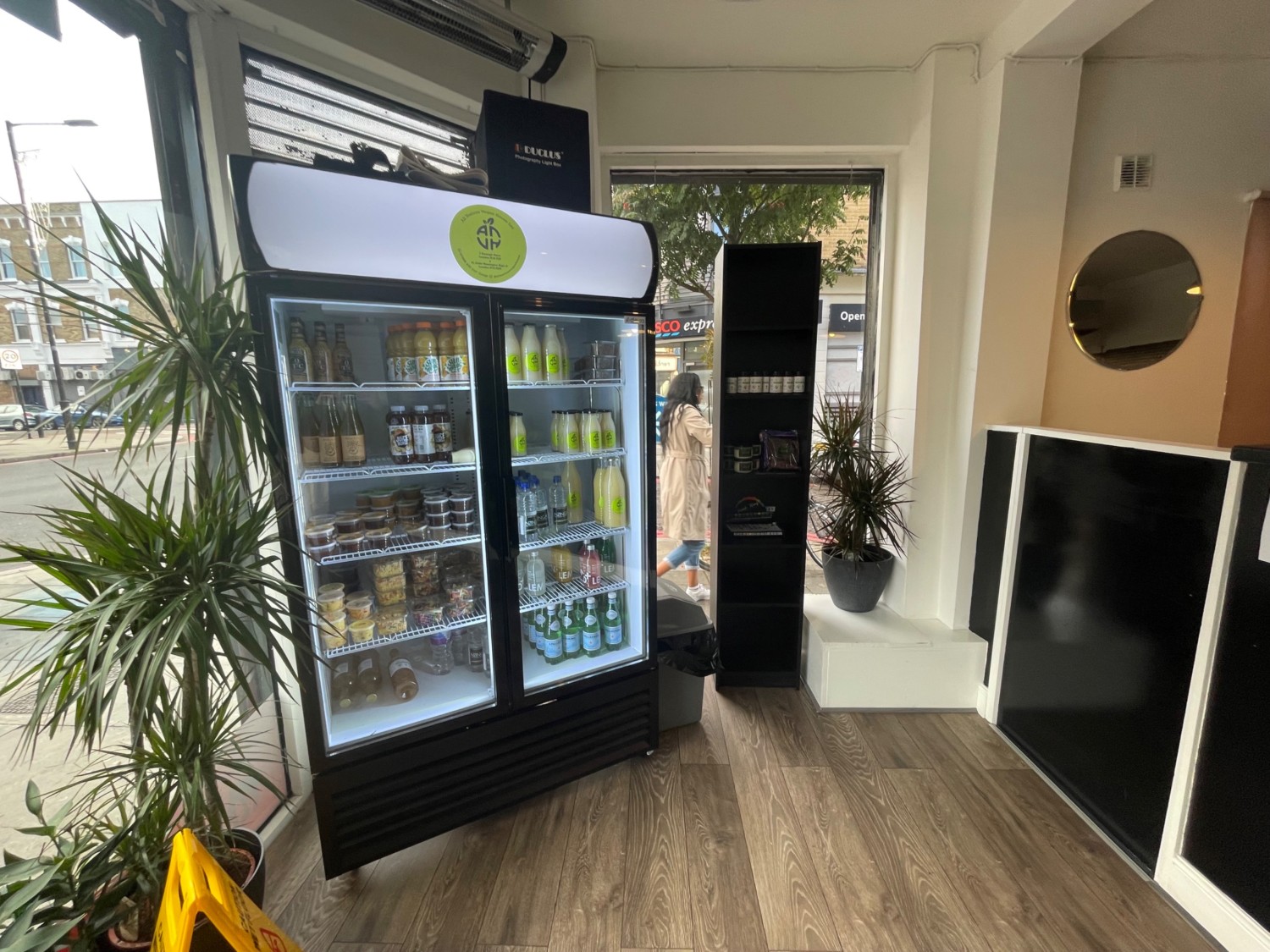 From main entrance, looking to the left. Retail fridge straight ahead.