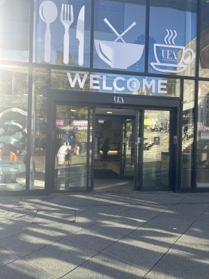 Wide automatic door entry to campus kitchen