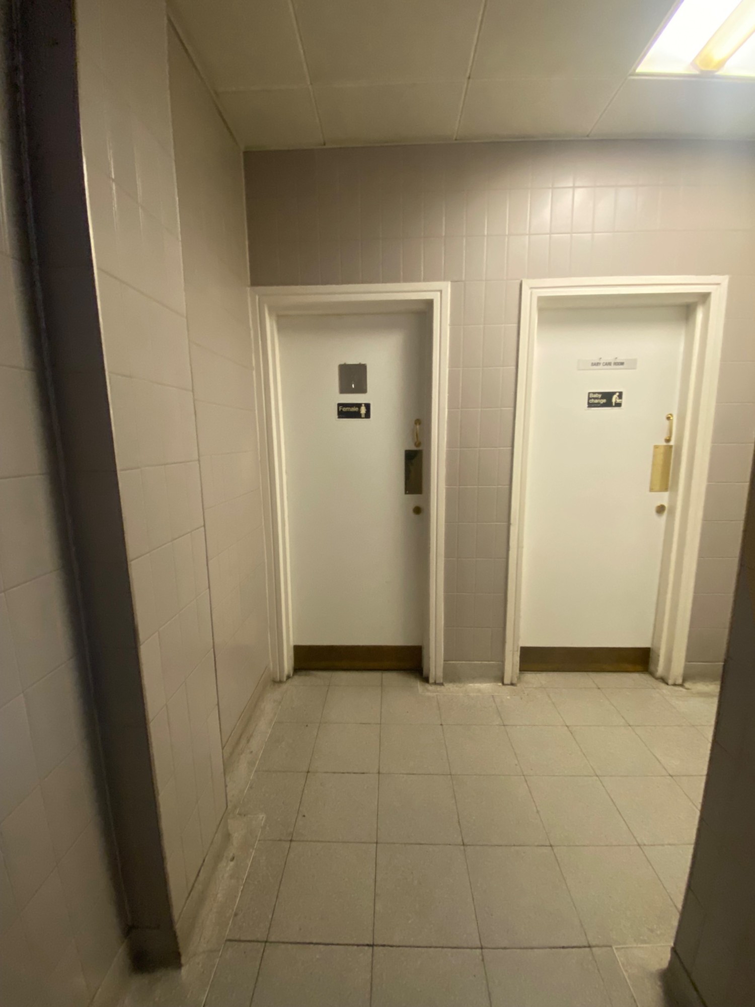 From opening, looking left. Female bathroom at back left. Baby change room at back right.