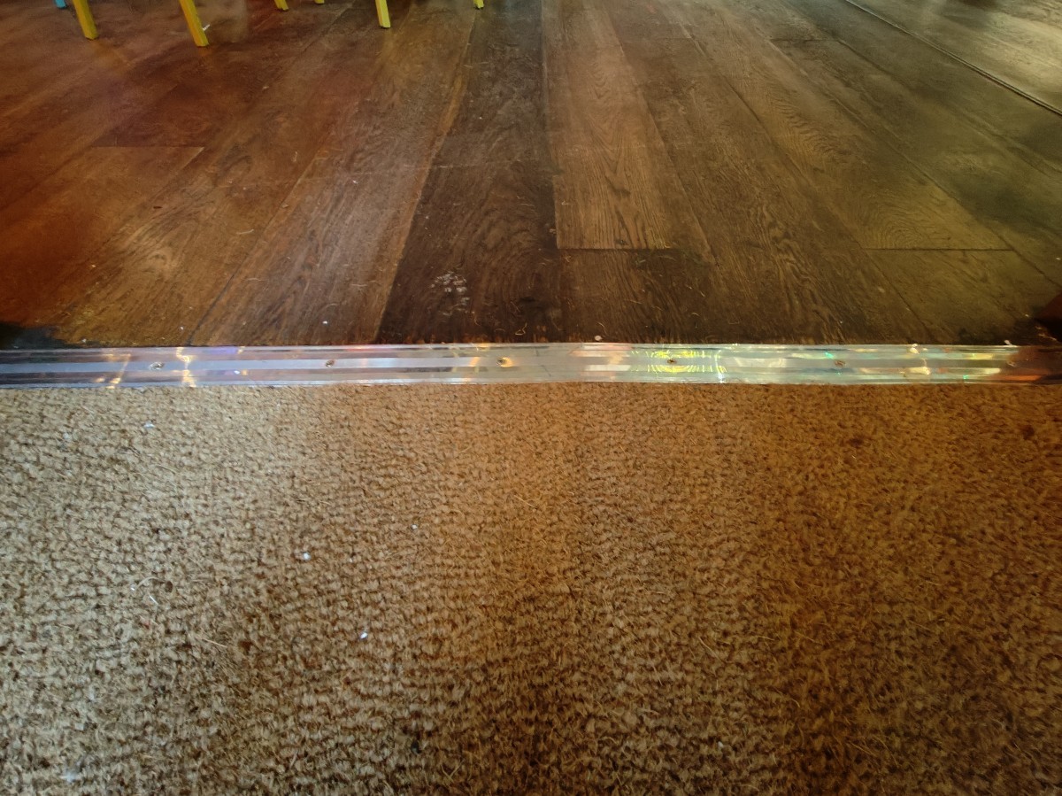 Small bump on threshold of door.