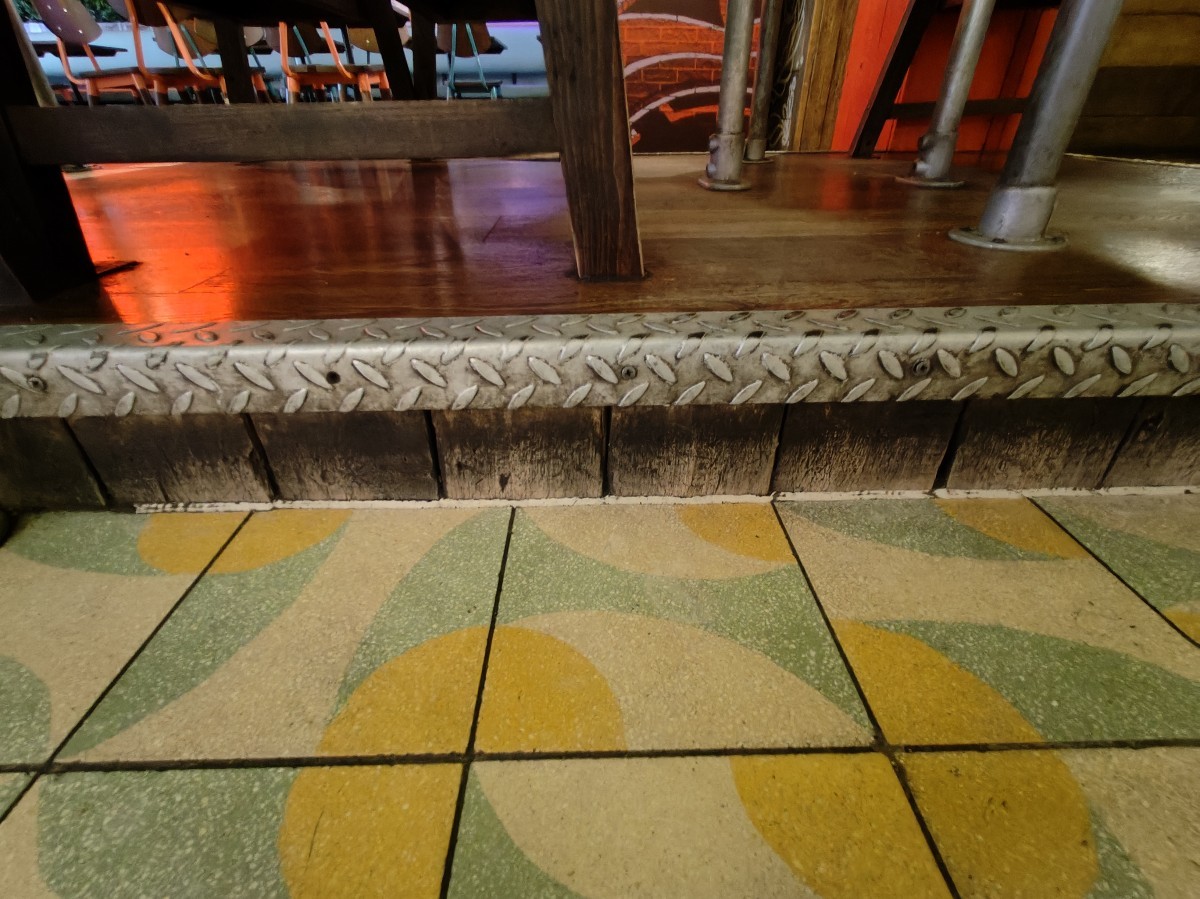 One step up to access the booths.