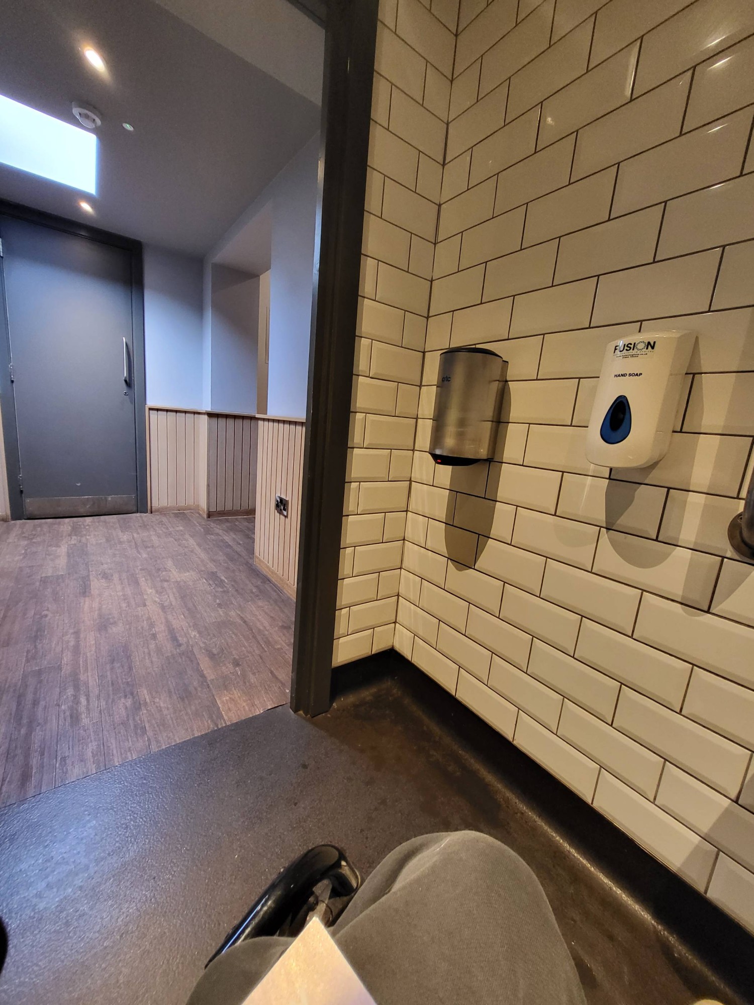 View of exit out of the bathroom.