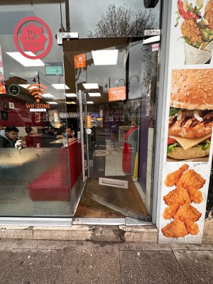 Glass door, push from left to open.