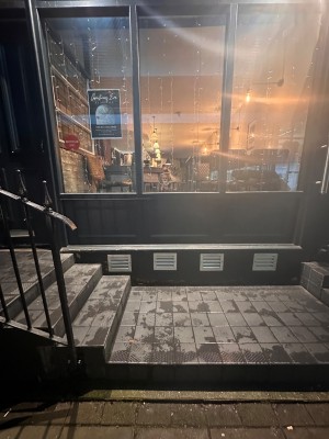 Step leading to stair landing ahead.