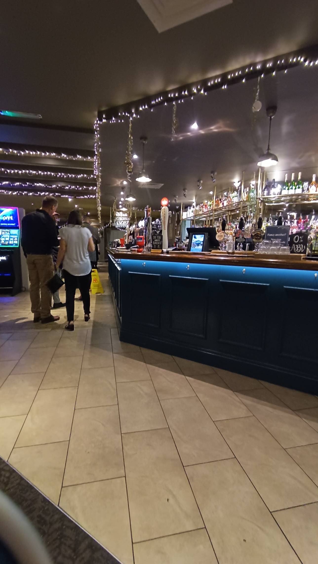 Different angle showing length of the bar. Same colours as above. No seating at the bar area.