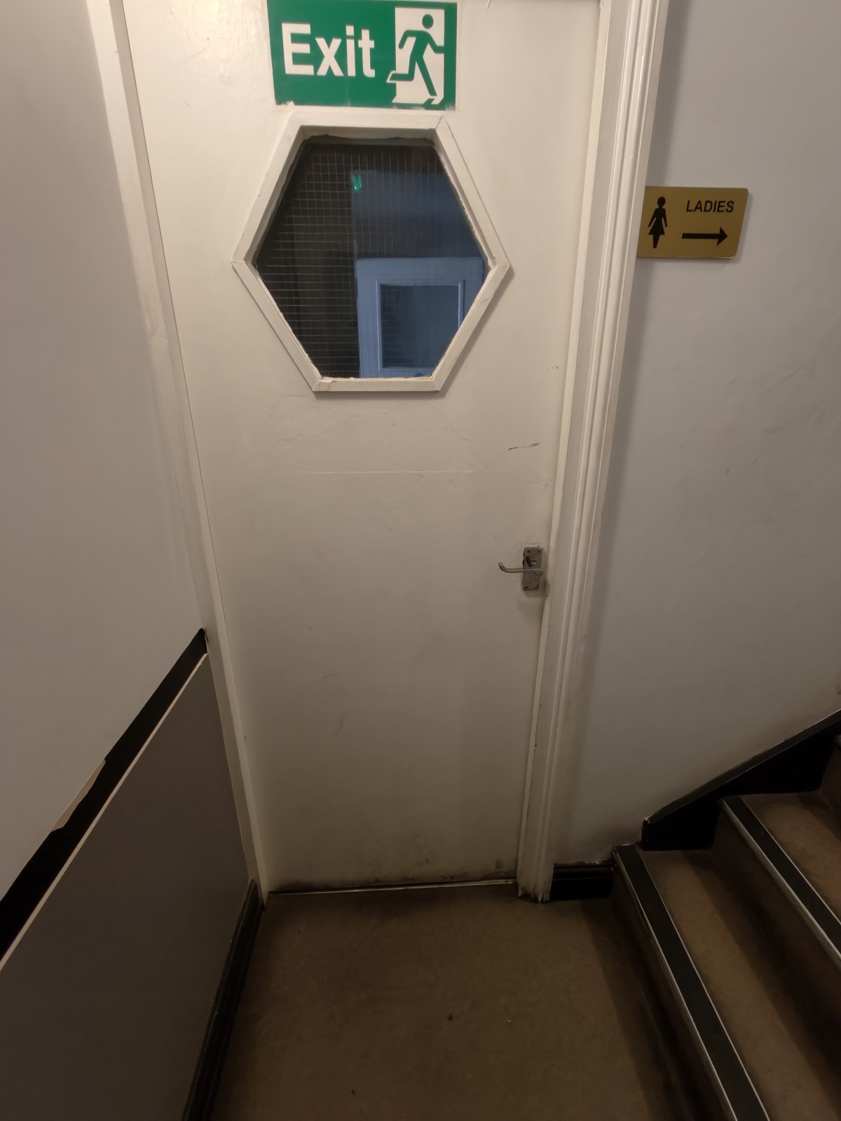 From first preceding door facing right. Stairs continue on right.