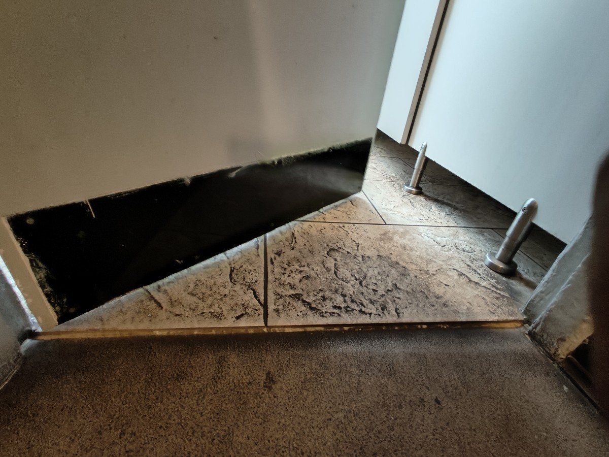 Small bump on threshold of door.
