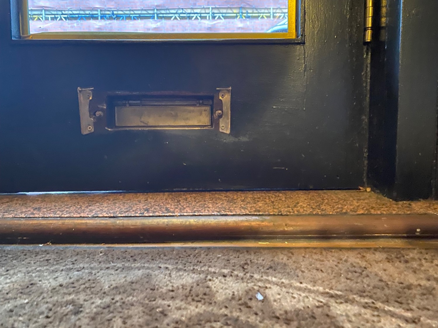 Very small step after doorway.