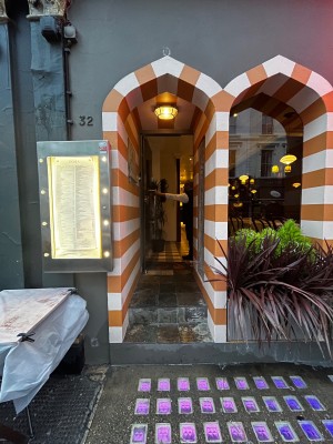 Open archway. Door at the back.