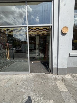 Glass door ahead. Push from left to open.