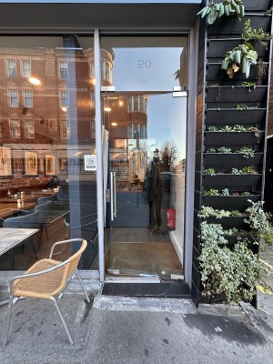 Glass door ahead. Push from left to open.