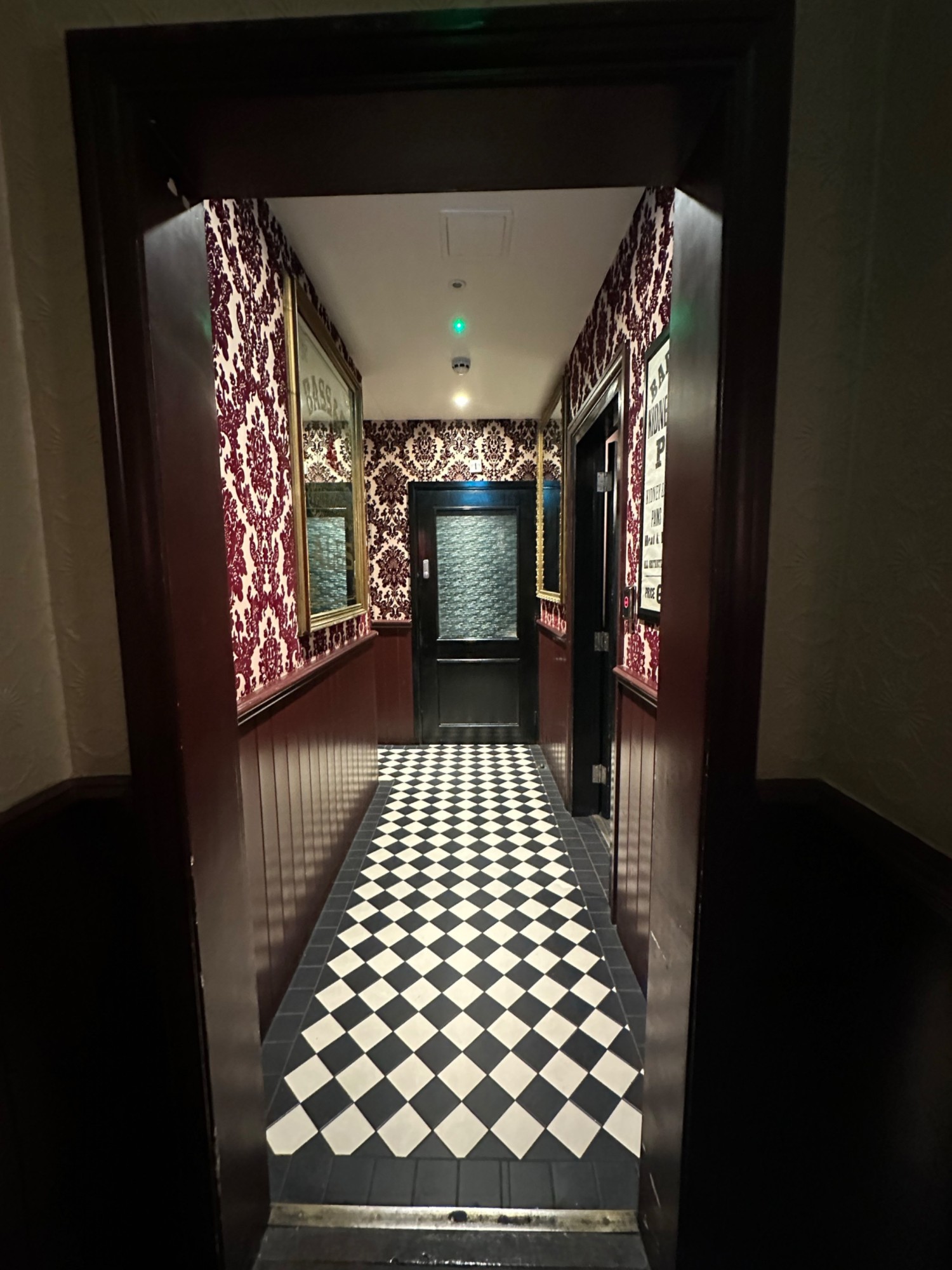 From archway facing straight. Path to toilets ahead.