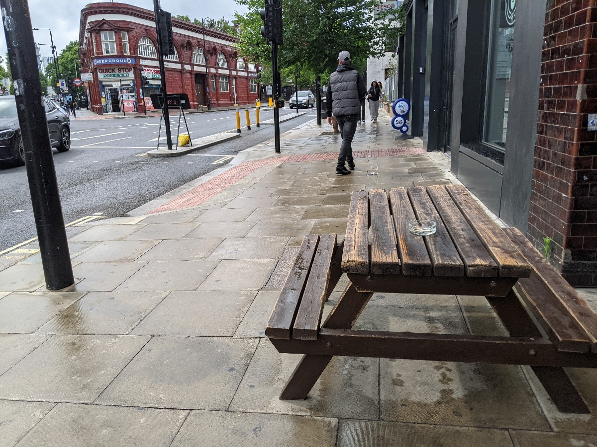 From entrance facing left. Picnic bench ahead.